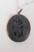A C19th yellow metal pendant set with a lava cameo carved in high relief of a winged putti, gold