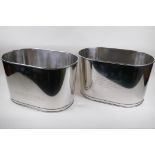 A pair of plated Champagne coolers bearing quotes from Napoleon Bonaparte and Lily Bollinger, 43 x