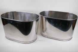 A pair of plated Champagne coolers bearing quotes from Napoleon Bonaparte and Lily Bollinger, 43 x