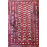 A fine woven red ground wool Bokharra rug, AF, 128 x 190cm