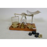 S. Mordan & Co, London, a set of brass postal scales complete with brass weights and later metric,