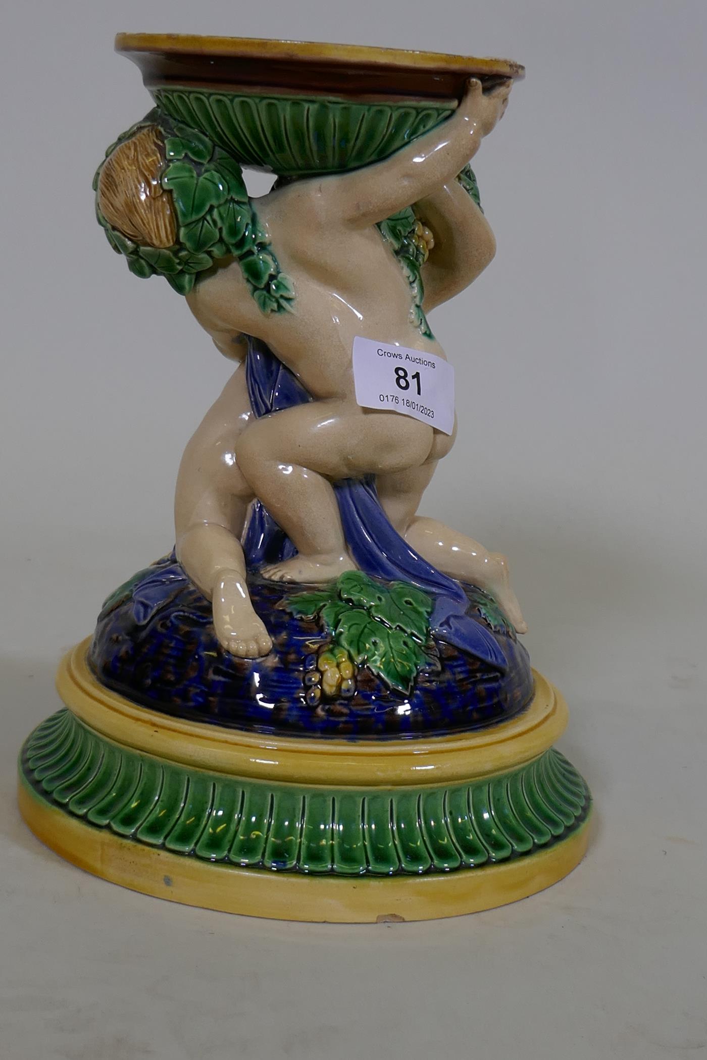 A Victorian majolica centre piece stand in the form of two putti, in the style of Minton, 23cm high, - Image 4 of 9