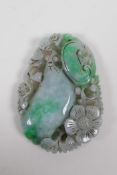 A Chinese mottled green and grey jade pendant with carved and pierced gourd and ruyi decoration, 6 x