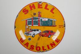 A vintage style convex enamel advertising sign for Shell, 30cm diameter