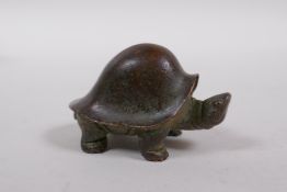 A Japanese style bronze okimono tortoise, 5cm long