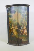 A late C18th/early C19th painted oak hanging corner cupboard, two doors painted with figures in