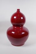 A large Chinese flambe glazed porcelain double gourd vase, 4 character mark to base, 44cm high