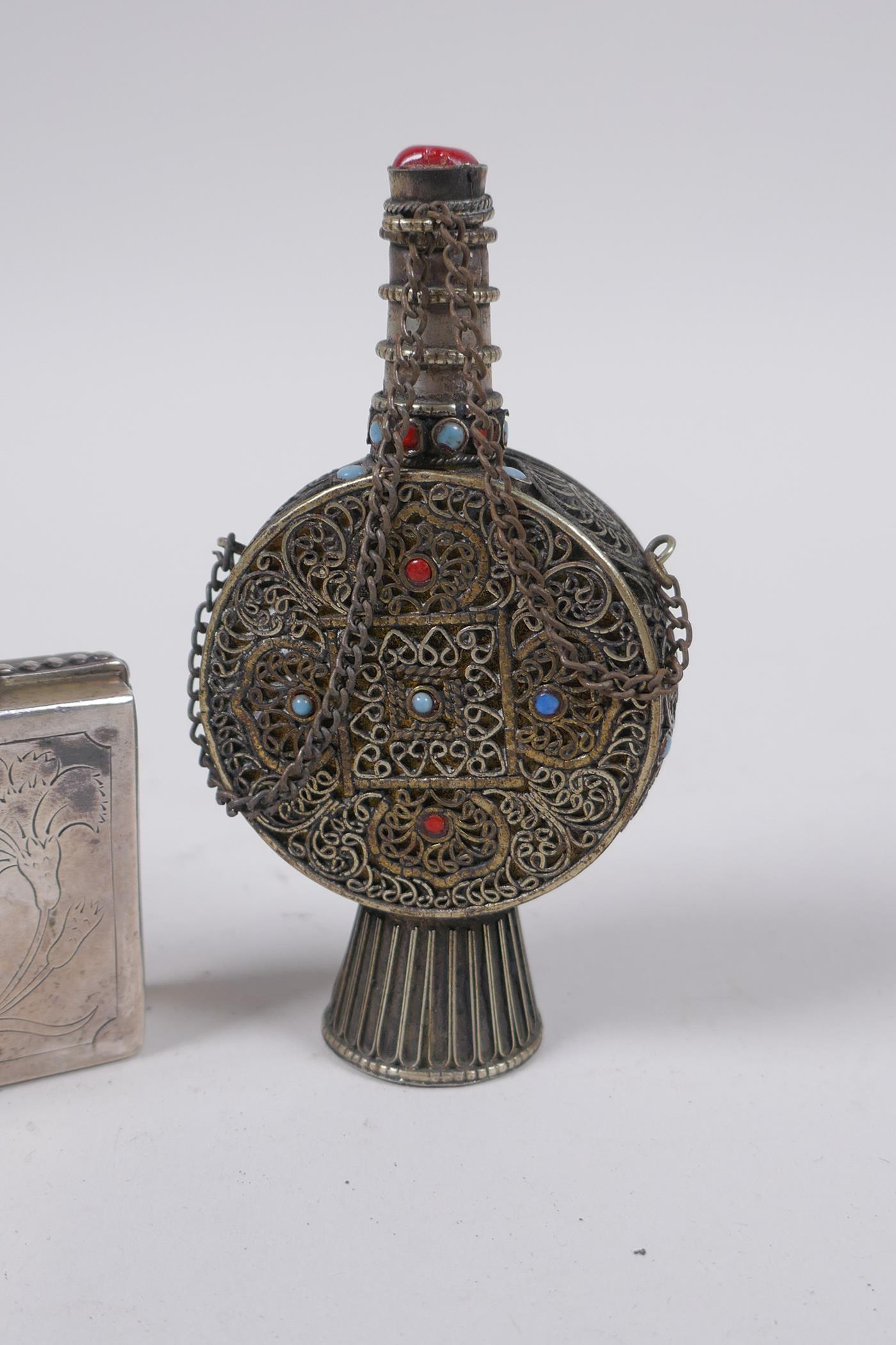 A Portuguese silver mounted glass scent bottle, and a white metal snuff bottle with filigree and - Image 2 of 6