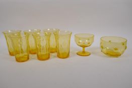 A set of six Thomas Webb amber uranium glass tumblers, a Thomas Webb amber uranium glass finger bowl