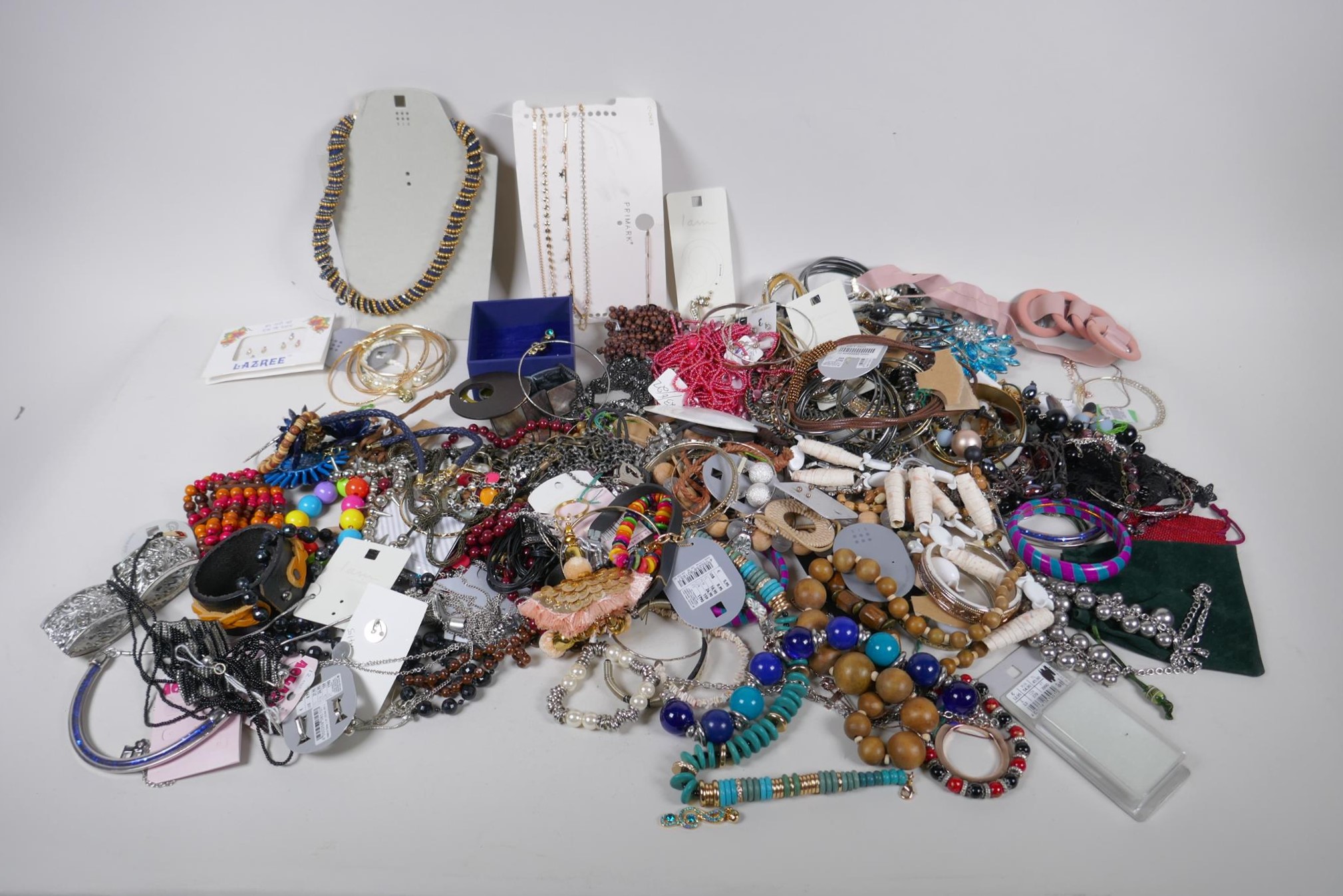 A quantity of costume jewellery including necklaces, bangles, earrings etc