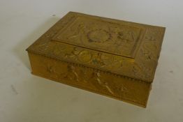 A C19th Elkington electrotype gilt plated jewellery box, decorated with putti and classical themed