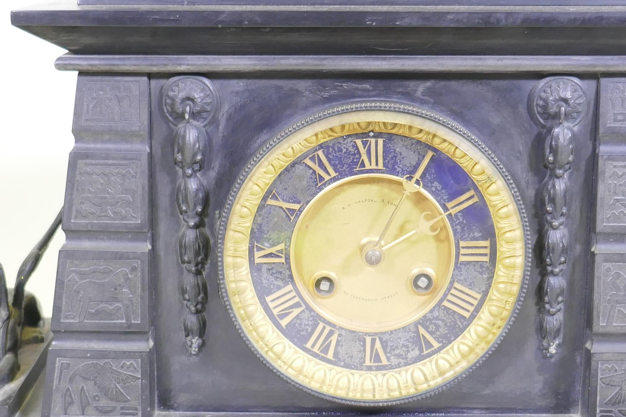 A C19th Egyptian Revival polished slate mantel clock, with patinated bronze mounts, the ormolu - Image 5 of 11