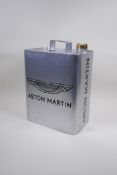 A painted metal gas can decorated with the Aston Martin insignia, 34cm high