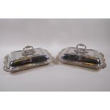 A pair of Sheffield plate entree dishes and covers, 31 x 22cm