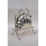 A silver plate muffin dish in the form of a clam shell, 27cm high