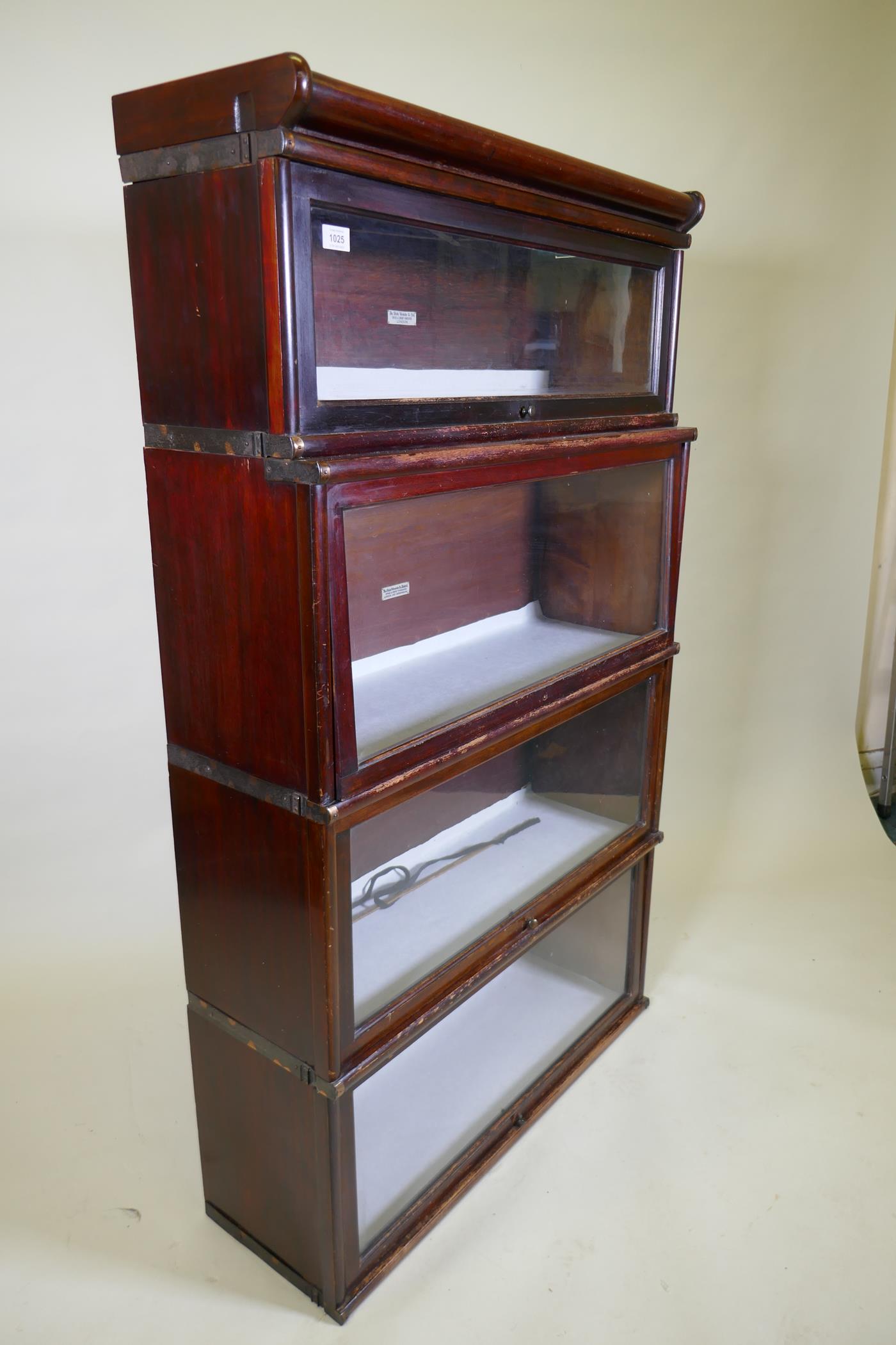 A mahogany Globe Wernicke bookcase of four sections, the upper stepped, lacks base, 87 x 29 x 48cm - Image 5 of 6