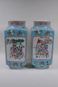 A pair of blue ground square form porcelain vases with famille rose decorative panels depicting