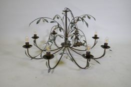 A brushed metal eight branch chandelier, with olive branch decoration, 90cm diameter