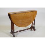 A Victorian walnut Sutherland table with turned supports and centre stretcher, 104 x 89 x 70cm