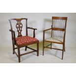 An C18th Chippendale style walnut chair with pierced splat back, raised on square supports and later