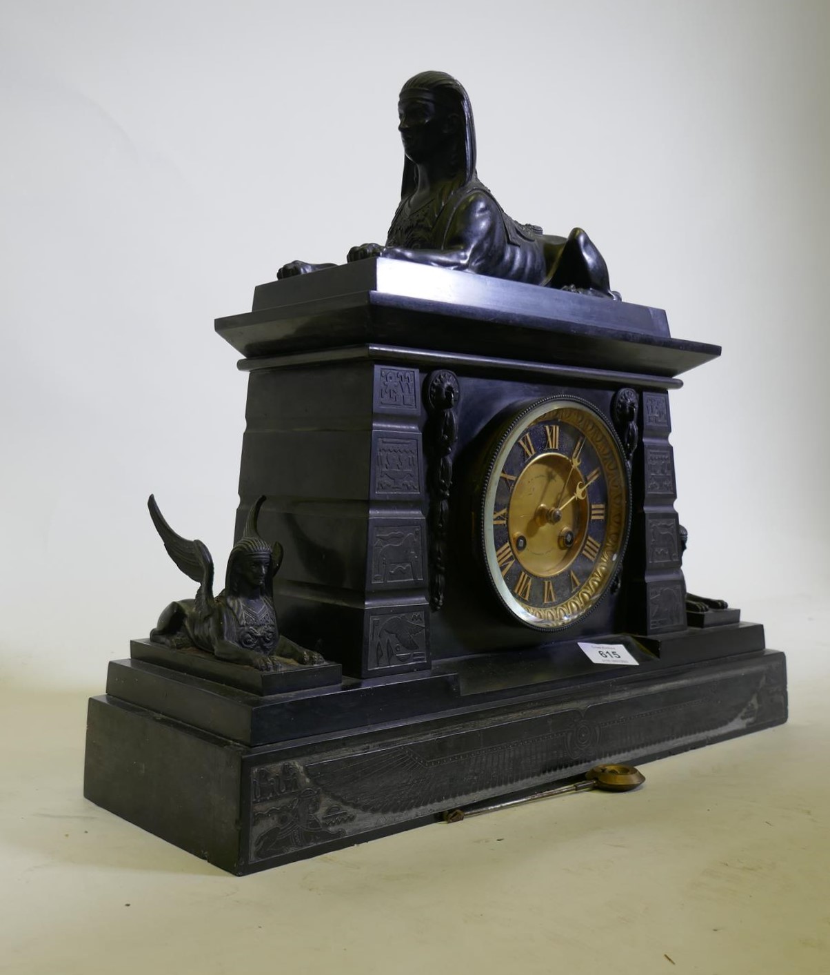 A C19th Egyptian Revival polished slate mantel clock, with patinated bronze mounts, the ormolu - Image 11 of 11