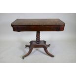 A Regency rosewood card table with Zebra wood crossbanded top, raised on a turned column with raised