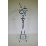 A patinated wrought metal armillary with bronze chapter ring, 150cm high
