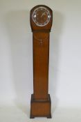 A 1960s Smiths grandmother clock, the eight day movement striking the Westminster chimes, with