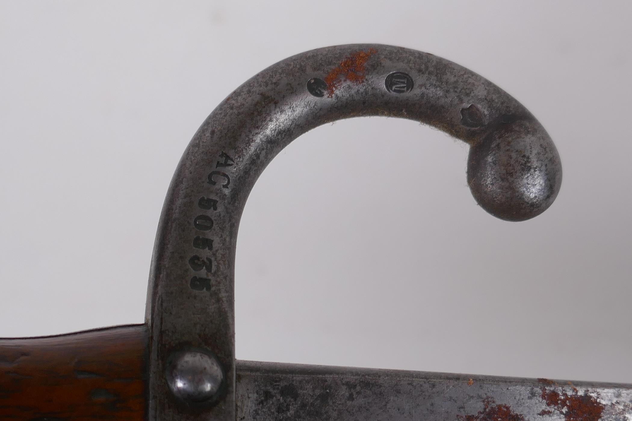 A late C19th French model 1878 bayonet, manufactured in Steyr, Austria, by The Austrian Arms - Image 5 of 6