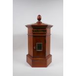 A hexagonol fruitwood table postbox, 46cm high