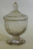 A C19th glass sweetmeat/preserve jar and cover, raised on a pedestal base of good colour, 26cm high