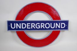 A painted cast iron London Underground sign, 60 x 45cm