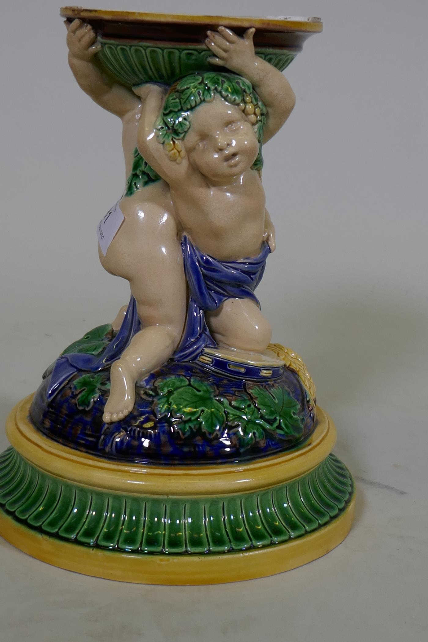 A Victorian majolica centre piece stand in the form of two putti, in the style of Minton, 23cm high, - Image 3 of 9