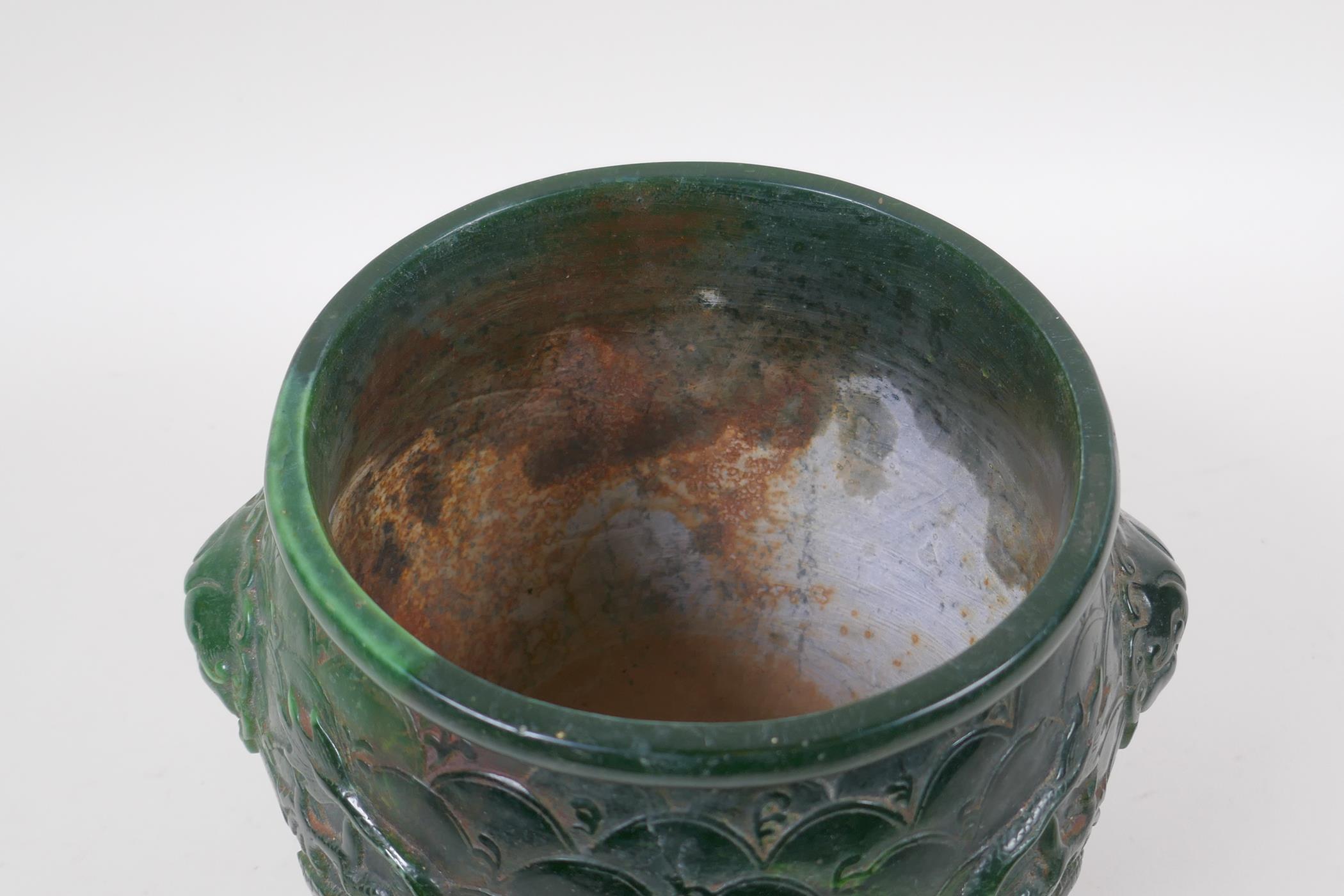 A Chinese reconstituted green hardstone jar with two lion mask handles and raised dragon decoration - Image 4 of 5