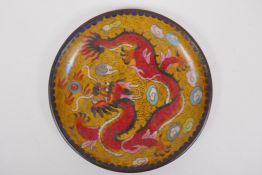 A Chinese yellow ground cloisonne dish decorated with a dragon chasing the flaming pearl, 20cm