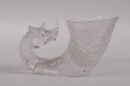 A Chinese moulded glass libation cup with mythical creature decoration, 12cm long