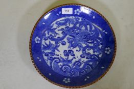A blue and white transfer printed dish with red rim and phoenix decoration, 30cm diameter
