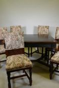 A set of six C19th continental oak dining chairs, with carved panel backs and sprung seats, raised