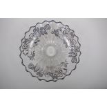 A silver overlaid glass fruit bowl decorated with a rose design, 32cm diameter