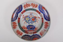 A Chinese republic porcelain dish with floral decoration in the Imari palette, 27cm diameter, AF