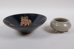 A Chinese Jian kiln conical bowl with deep and auspicious character decoration, 15cm diameter, and a