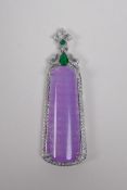 A white metal pendant set with a large amethyst coloured stone, cubic zirconia and green stones, 6cm