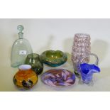 A collection of studio glass, decanters and bowls and a Caithness Cadenza hearts vase, decanter 25cm