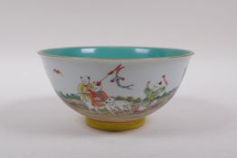 A polychrome porcelain rice decorated with children playing in a garden, and a turquoise interior,
