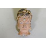 A Ghandar style painted clay head, 14cm high