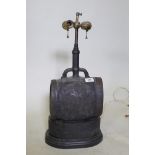 A table lamp in the form of an oriental caved wood barrel with metal mounts, 58cm high