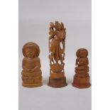 An Indian boxwood carving of a dancer and another two carved in the form of Buddha, largest 23cm