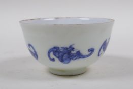 A blue and white porcelain tea bowl with bat decoration, Chinese KangXi 6 character mark to base,