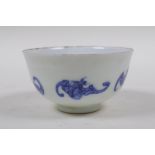 A blue and white porcelain tea bowl with bat decoration, Chinese KangXi 6 character mark to base,