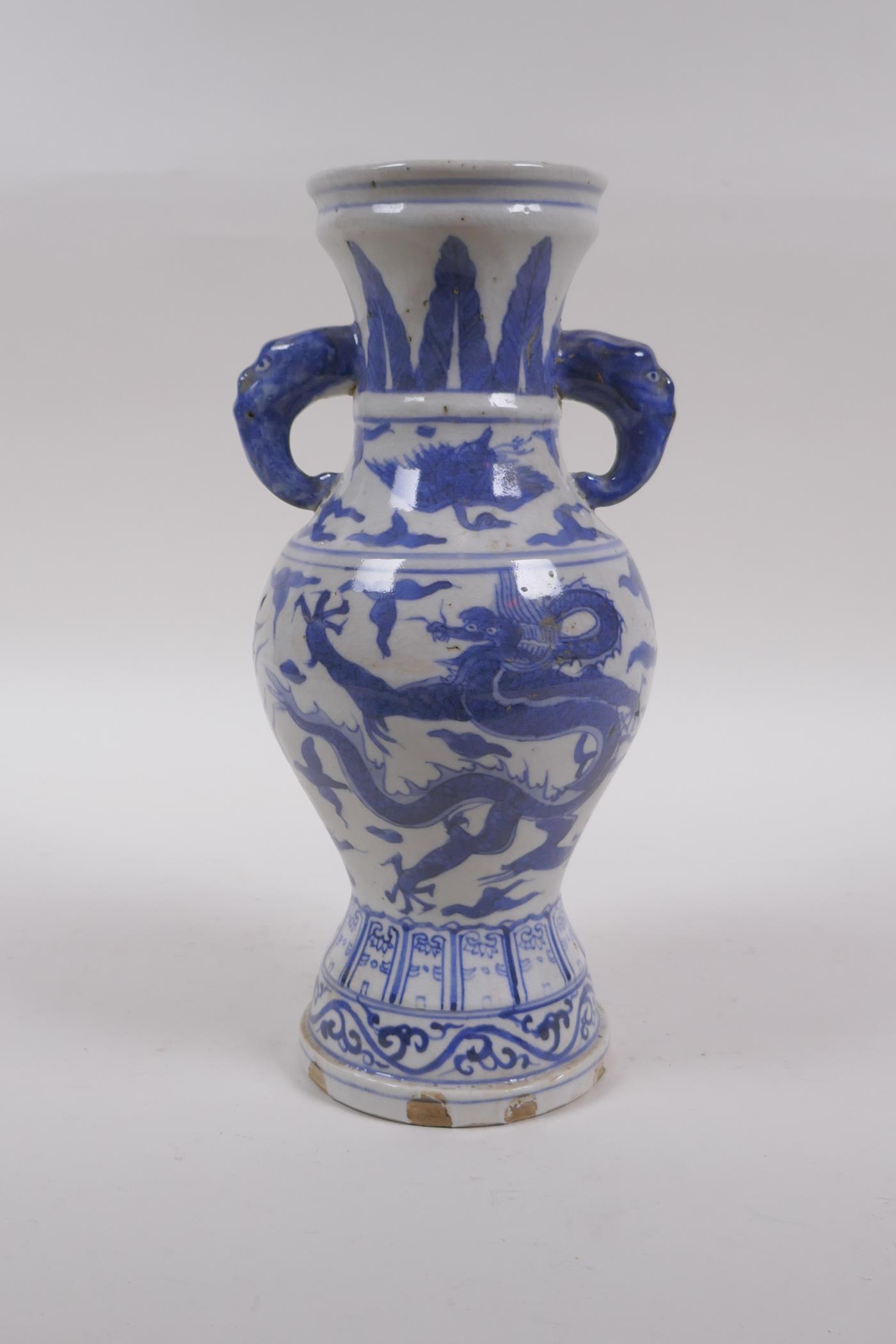 A Chinese blue and white porcelain vase with two elephant mask handles and dragon decoration, 23cm - Image 5 of 7